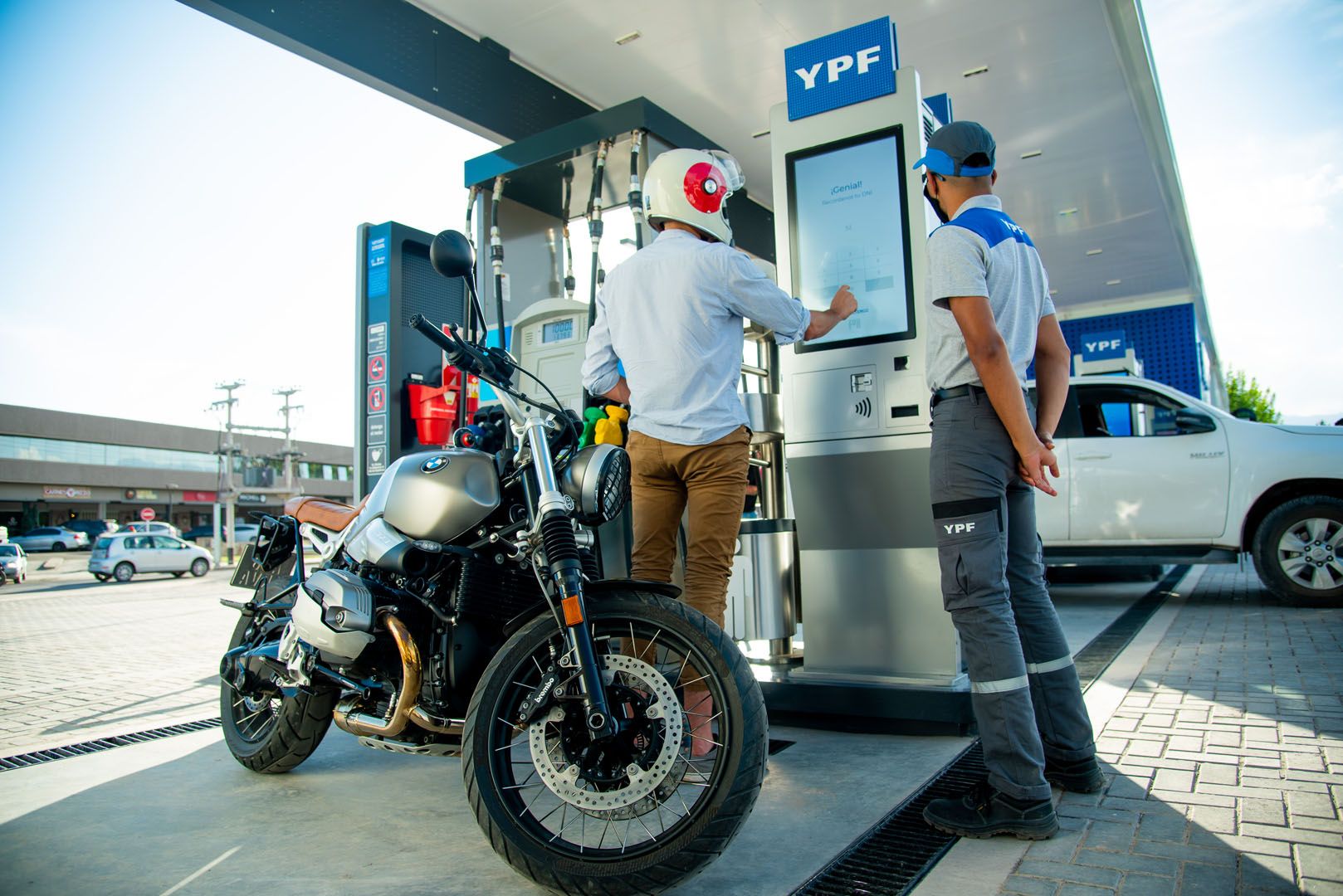 YPF self-service kiosk in use at a fueling station